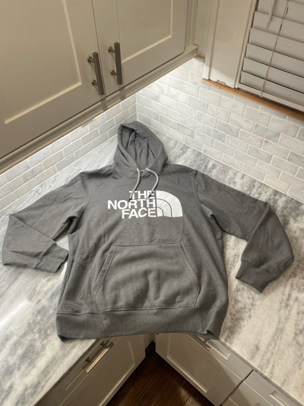 The North Face Gray Pullover Hoodie with White Logo